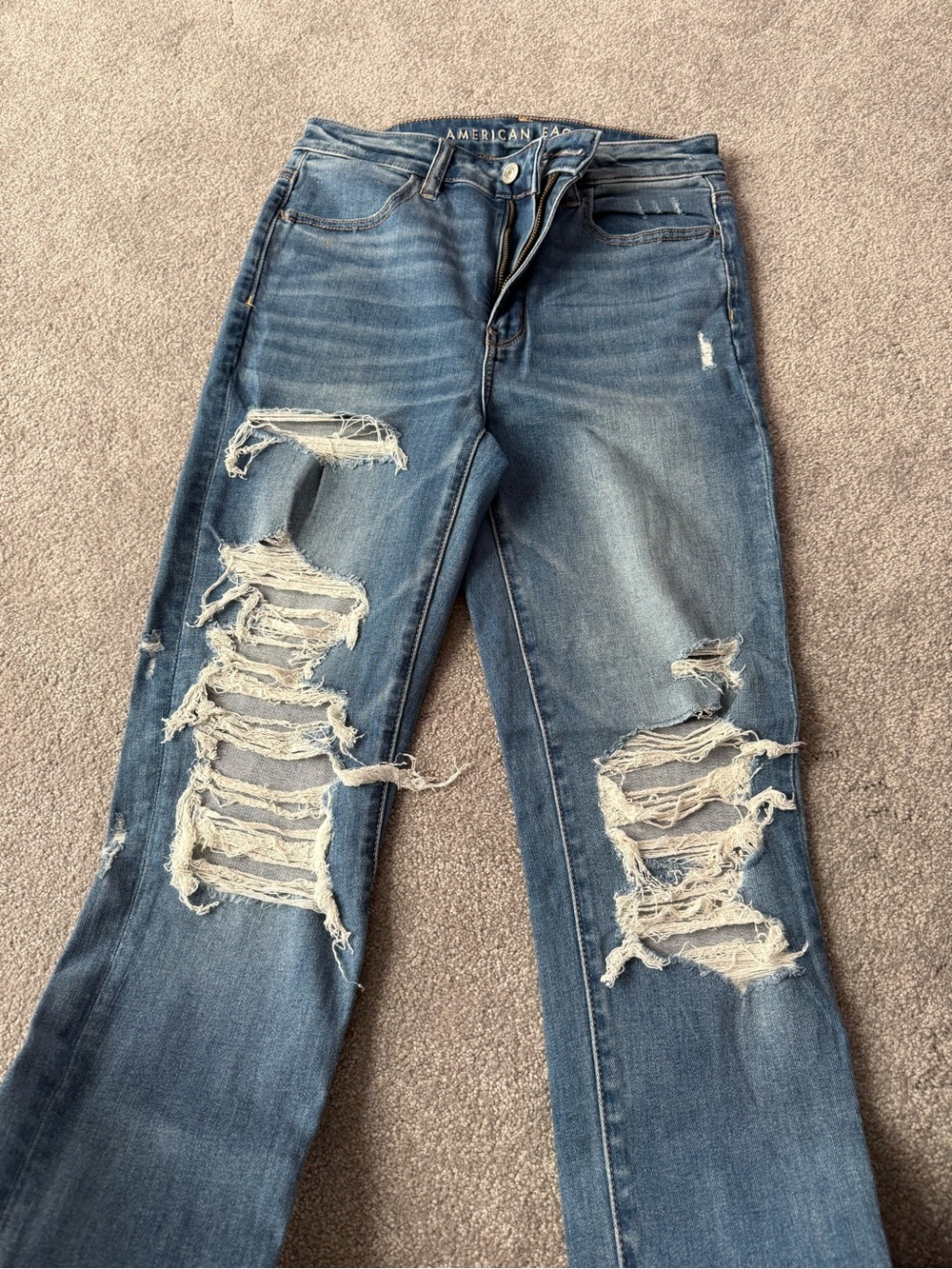 American Eagle Outfitters Women’s Ripped Medium Blue Flare Jeans